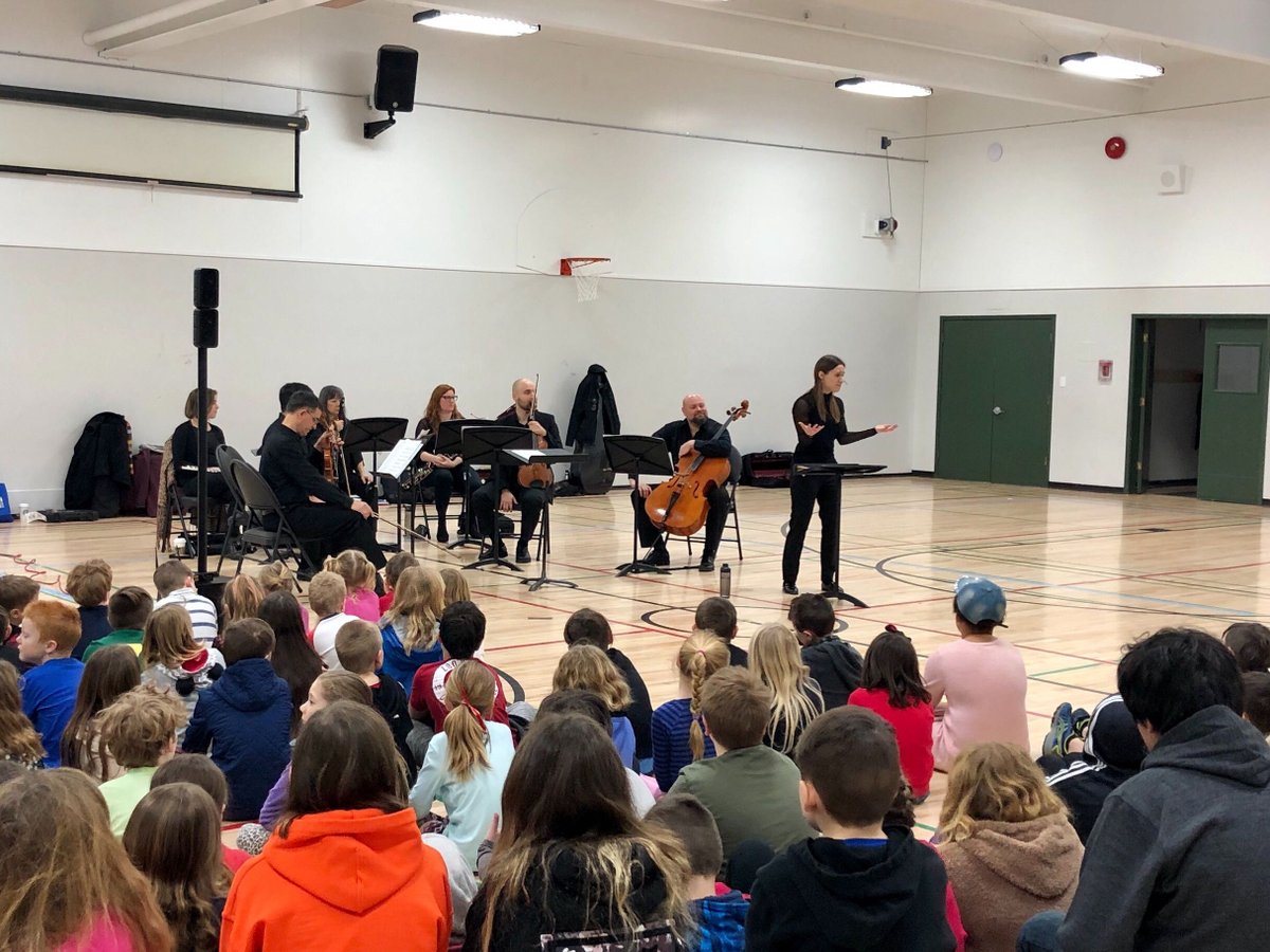 KamSymphony's tweet photo. Music Director Dina Gilbert and KSO musicians in action at some of our #Conducting101 workshops yesterday. Itโs a fun, interactive and educational music experience presented at local schools. Learn more at https://t.co/lnnynqbSwn. #MusicEducation #MusicEducationMatters https://t.co/WxJfe1FwB4