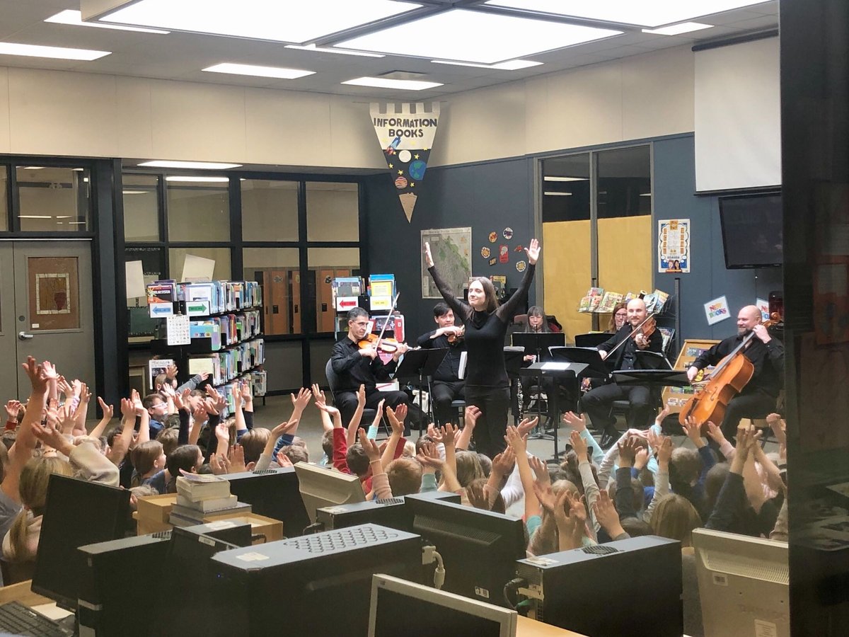 KamSymphony's tweet photo. Music Director Dina Gilbert and KSO musicians in action at some of our #Conducting101 workshops yesterday. Itโs a fun, interactive and educational music experience presented at local schools. Learn more at https://t.co/lnnynqbSwn. #MusicEducation #MusicEducationMatters https://t.co/WxJfe1FwB4