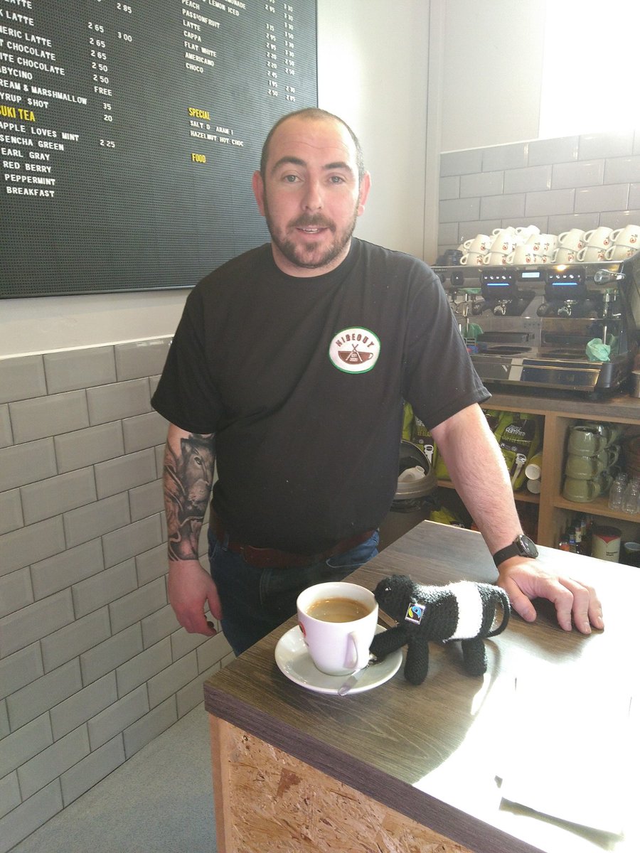 FairDumfries's tweet photo. Hooray! Just in time for #FairtradeFortnight ! Hideout, a new cafe in Queensberry St, opened at the weekend and is serving Fairtrade tea, coffee and hot chocolate. #Doonie #FairtradeBeltie popped in to say hi to Jamie and the team. https://t.co/SR6MwAo0yP