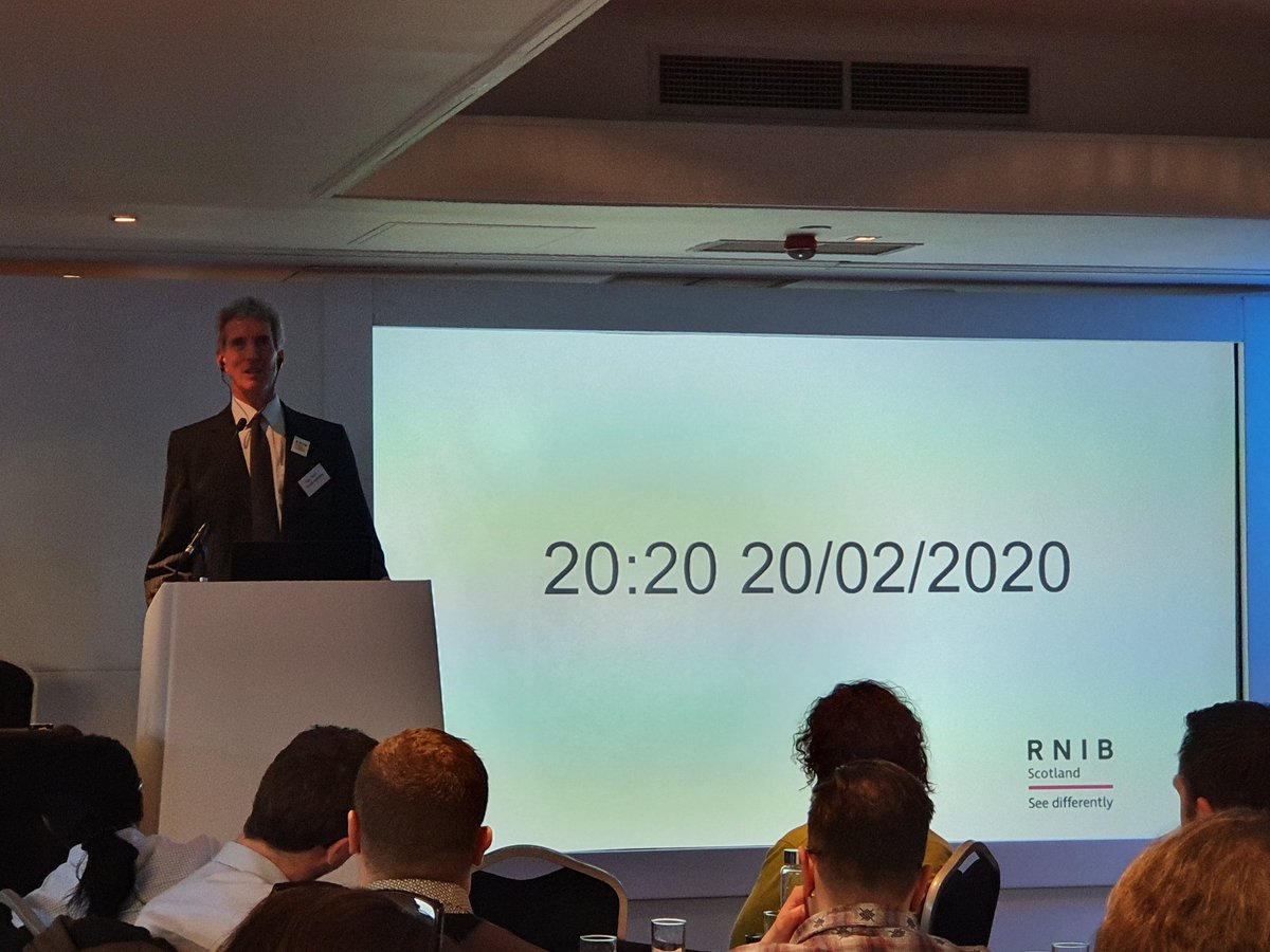 martinallen78's tweet photo. Brilliant of @kenreid59 to use Abba to point out that hashtags need proper capitalisation to be #accessible for example #YearOfVision not #yearofvision which sounds like Eurovision on a screen reader! #a11y #ScotVision2020 image shows Ken on stage. https://t.co/pM8Y16pqAa