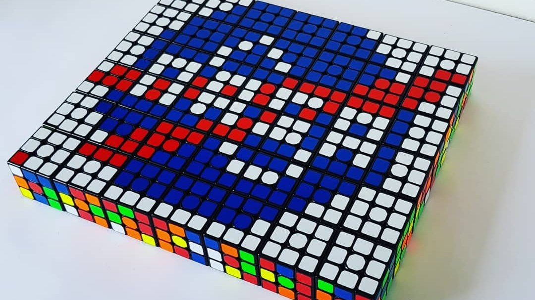 CuberNaked's tweet photo. Nasa 42: One small step for man, one giant leap for mankind. 
It's been 51 years since humans first landed on the moon. Now @elonmusk is trying to land us on Mars. So when that happens I'll make an artwork for SpaceX.
#rubiks #3x3 #pattern @Rubiks_Official #learn #ai #art #pixel https://t.co/Sjk8vbGGMu