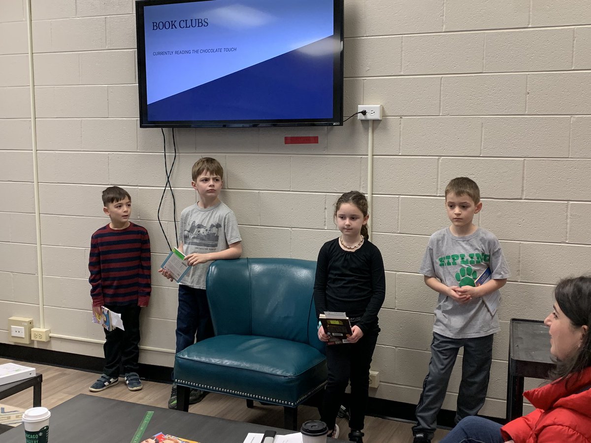 First graders presenting about book clubs at our PTO meeting. We loved hearing about your books. Keep up the great reading! #kip109, #engage109