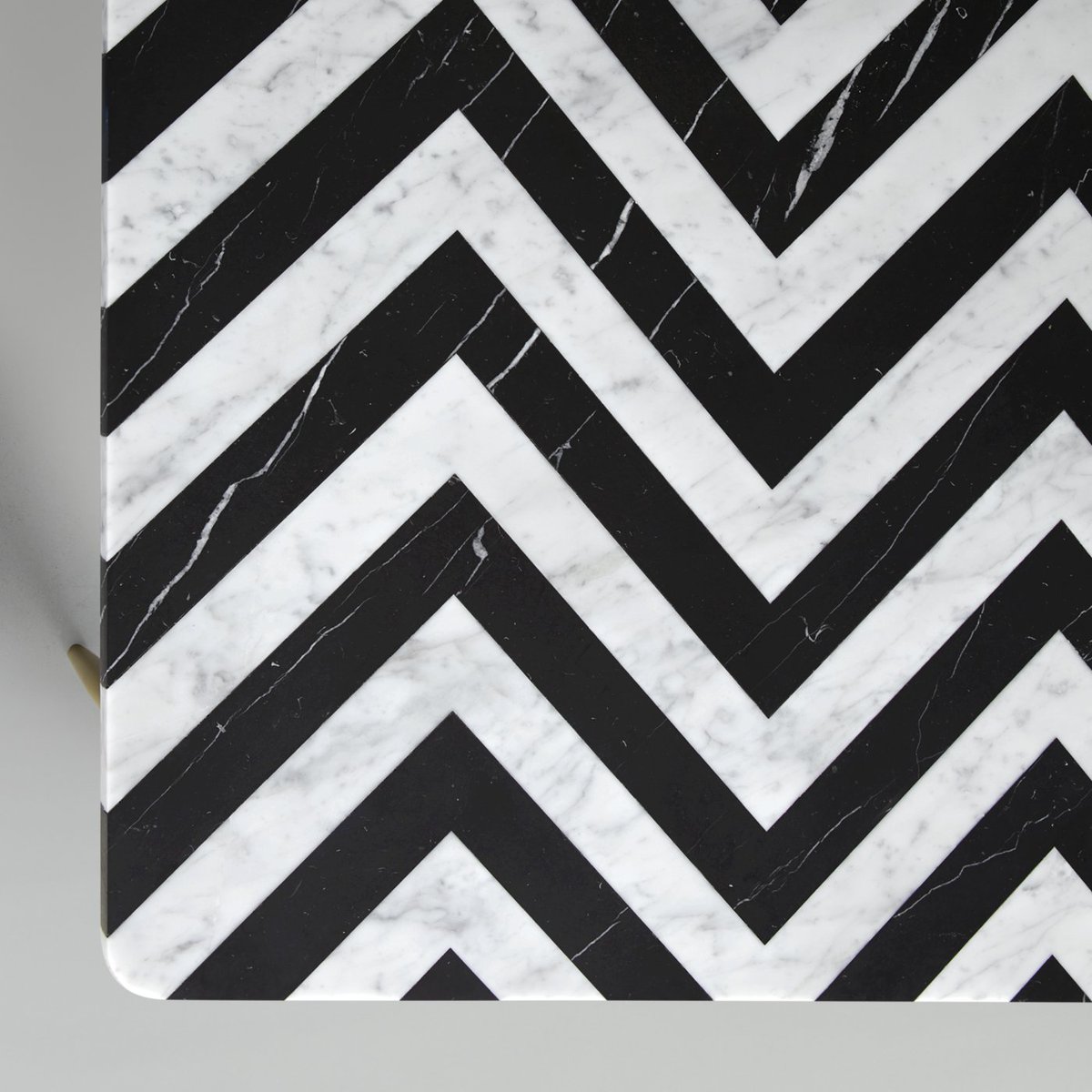 LapicidaLtd's tweet photo. SAVE up to 70% in our New Year Sale. Save on this #BethanGray designed #Herringbone Table. #Carrara and #Black Nero Marquina #marbles unite in a striking zig-zag #design atop brass #table legs. Visit our showroom #Sale now. Whilst stocks last. https://t.co/B1NNkP1h5P https://t.co/MWnKbQZeST