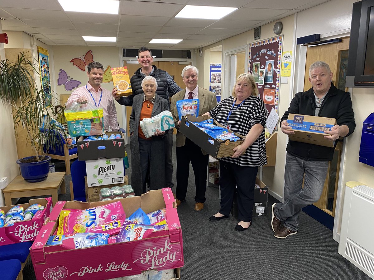 Cllr Pat Latty with Terry Dudley presenting a huge crate of food to Queensway School. This was paid for by Otley Masonic Lodges to ensure no child can starts the day without breakfast.