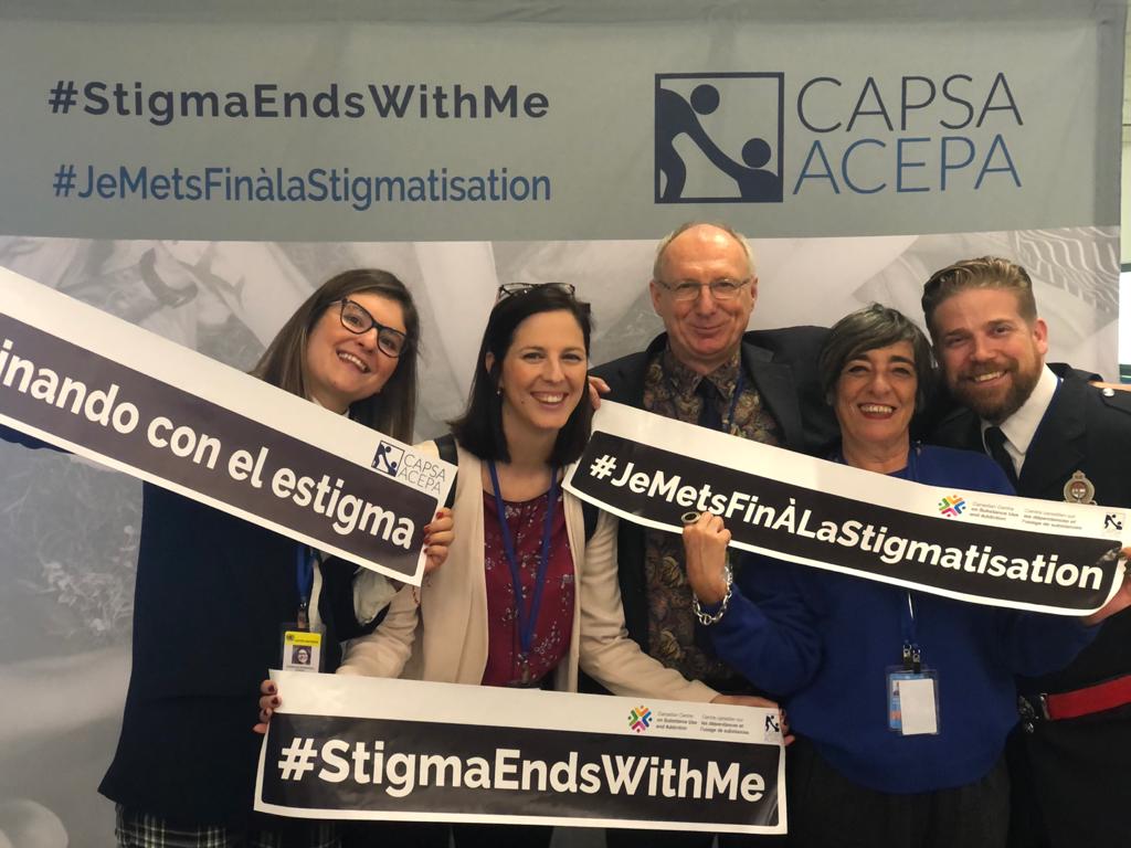 Dianova_org's tweet photo. Visiting colleagues at the @CAPSACanada stand with ED Gord Garner from @CAPSAOttawa, @ThunderbirdPF some great conversations to end the stigma #StigmaEndsWithMe #QuitStigmaNow #CND63 #CND2020 https://t.co/bcMfn6PT09
