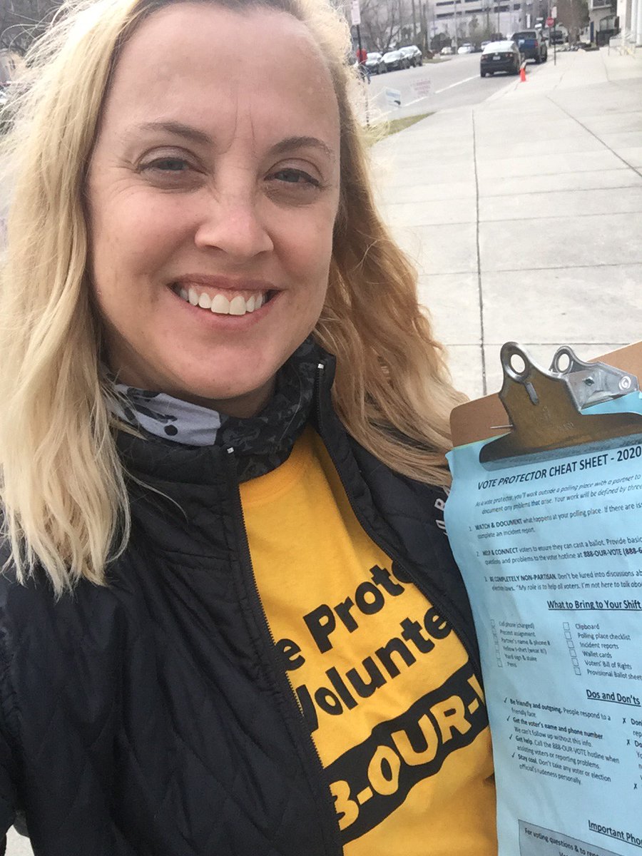 democracync's tweet photo. 🗳️@democracync's vote protectors are standing by — even in the rain 🌧— to help answer voter questions and address voter problems. Don't see a yellow tee at the polls? Call the nonpartisan voter hotline directly at 888-687-8683 (888-OUR-VOTE) or tag questions to #votehot https://t.co/ffKvsjBBf3