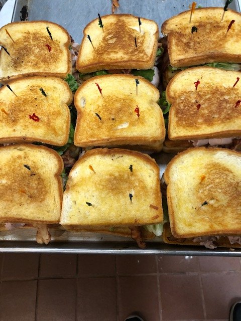 CalicoCounty's tweet photo. Our @CalicoCounty  #ClubSandwiches lined-up to be cut and put on serving trays for a lunch catering! https://t.co/39L2oXxzyN