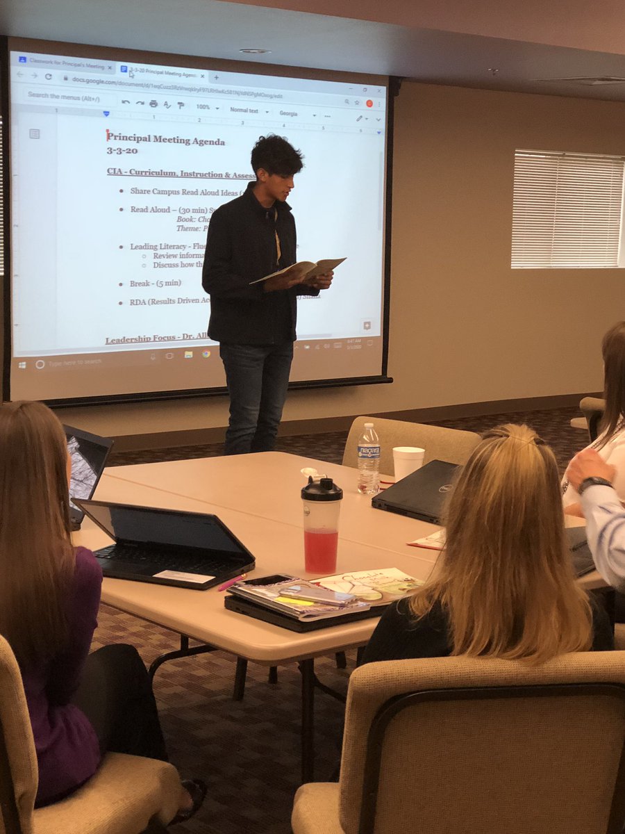 hipchicaggie's tweet photo. MFHS student reading this months read-aloud book to campus leaders, “Chocolate Milk, Por Favor.” Principal meetings focus on Leading Literacy. How can we show empathy &amp; facilitate academic success for language learners new to this country?  @MarbleFallsISD https://t.co/XBa5Xu7XFf
