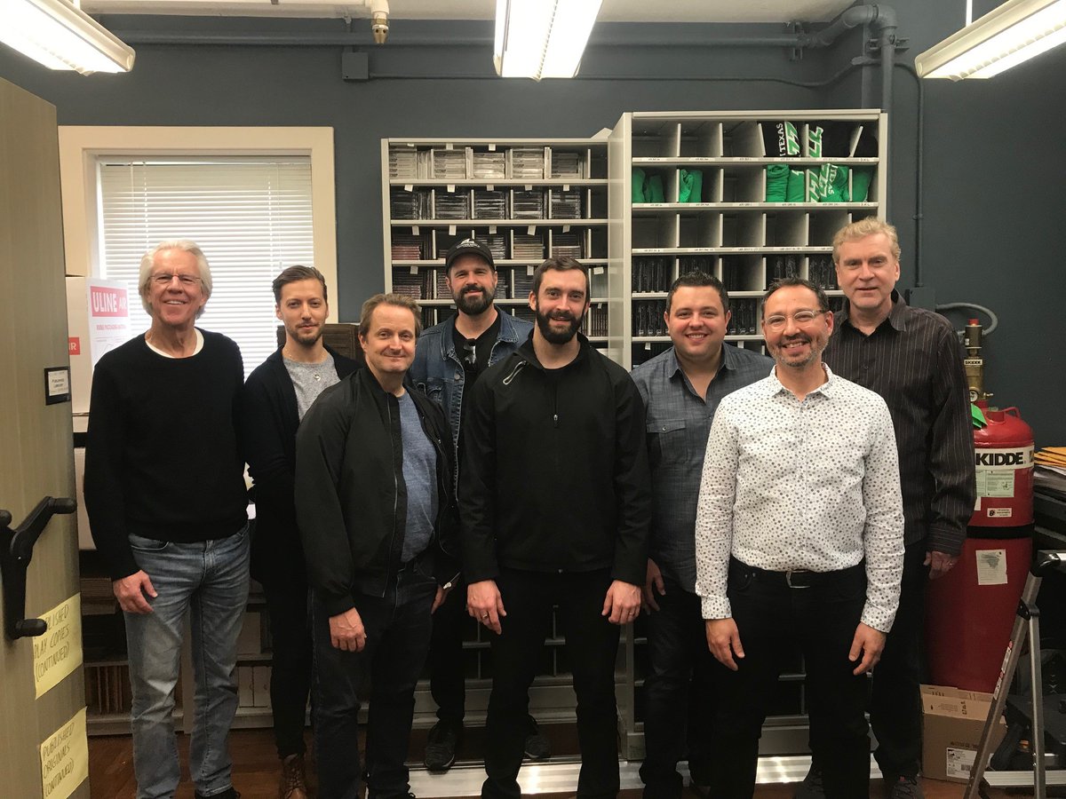 UNTCoM's tweet photo. ALUMNI/FRIENDS VISIT #UNTCoM: L-R - Jim Ed Norman ('68-'69); Philip Dizack, prof. of jazz trumpet; David Mann; Jamie Hovorka (BM '05); Mike Cottone; Mike Boscarino; Alan Baylock (MM '94), director and Tom Evans. @JohnWRichmond2 @The_SCL @ASCAPFoundation @UNTPrez @THR @UNTnews https://t.co/xVFB4Awtts