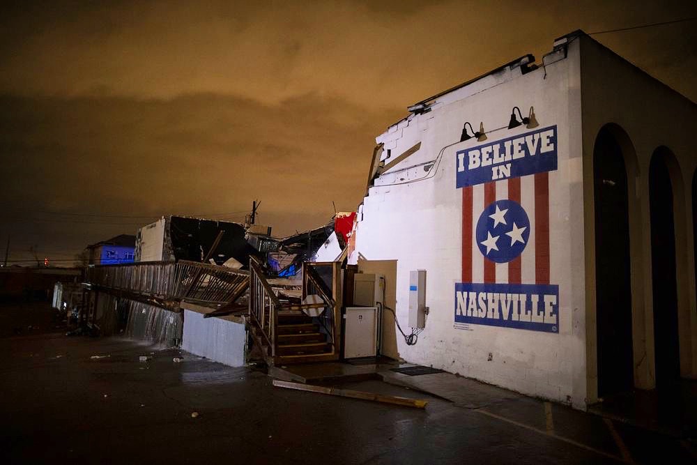 4kingandcountry's tweet photo. By God’s grace, we’re all unharmed, but the same cannot be said for our city- which has taken quite a hit. Be praying for our community as it’s been shocking to see all the devastation this morning. -j&amp;L 📸: Brett Carlsen (Getty Images) #NashvilleTornado https://t.co/pvRqGWumKt