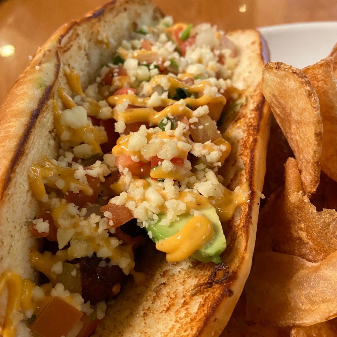 MarketOnHouston's tweet photo. The Gunter Dog. Bacon wrapped, chipotle aioli, avocado, queso fresco, on toasted brioche. #MOH https://t.co/NTTNccDhpY