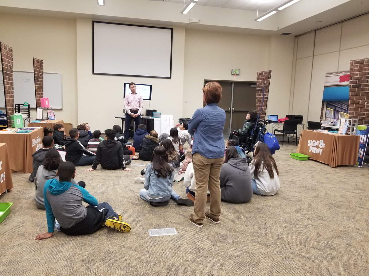 yacenter's tweet photo. Welcome to #AmeriTowne Vista Peak Exploratory School! Students are getting briefed on their day before heading into their shops to get to work! #APSPL @aurorak12 https://t.co/QeKIZRXBsR