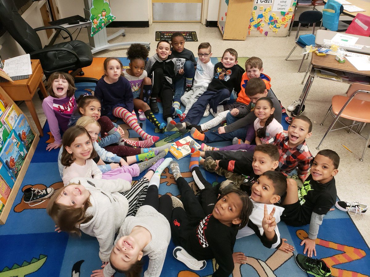 JaniceCirone's tweet photo. Oakview Elementary School is full of spirit this week! Today we celebrated crazy sock day...look at these excited kids showing off there craziest socks! #FoxinSocks @OVELEM @wdeptford #ovreads https://t.co/KytW3R1HEc