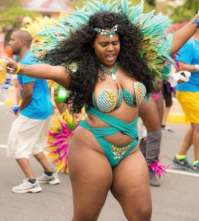 beautiful plus size women in carnival outfits.