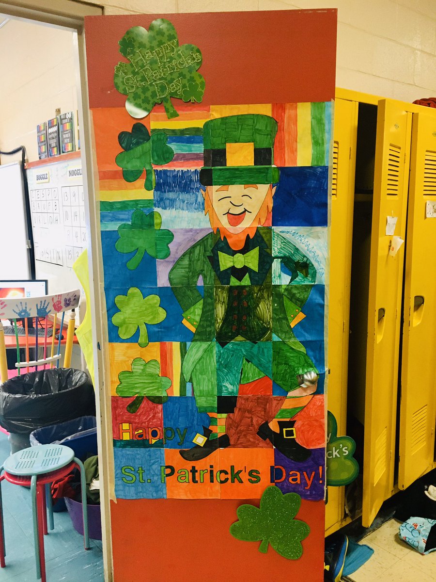 Madame_Kennedy's tweet photo. We’re certainly getting into the Paddy’s Day spirit! 🍀☘️🌈🖍 #collaborativedoor #StPatricksDay #decoratingfun #art @NLESDCA @stmaryselem https://t.co/J6e2Mt8B4R