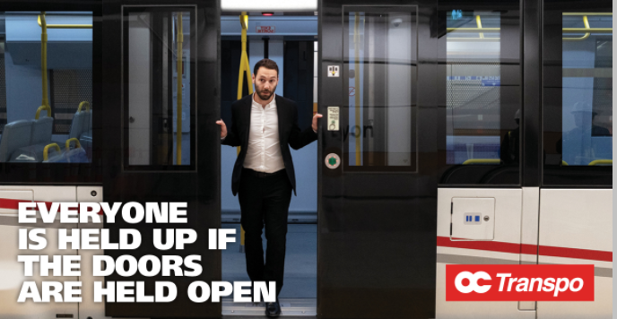 OC_Transpo's tweet photo. O-Train Line 1: The earlier delay at Parliament station was caused by a customer interfering with the train doors. Blocking the doors will delay the train for everyone. Please wait for the next train. Trains arrive every five minutes or less at most times. https://t.co/C22LmjpmbZ