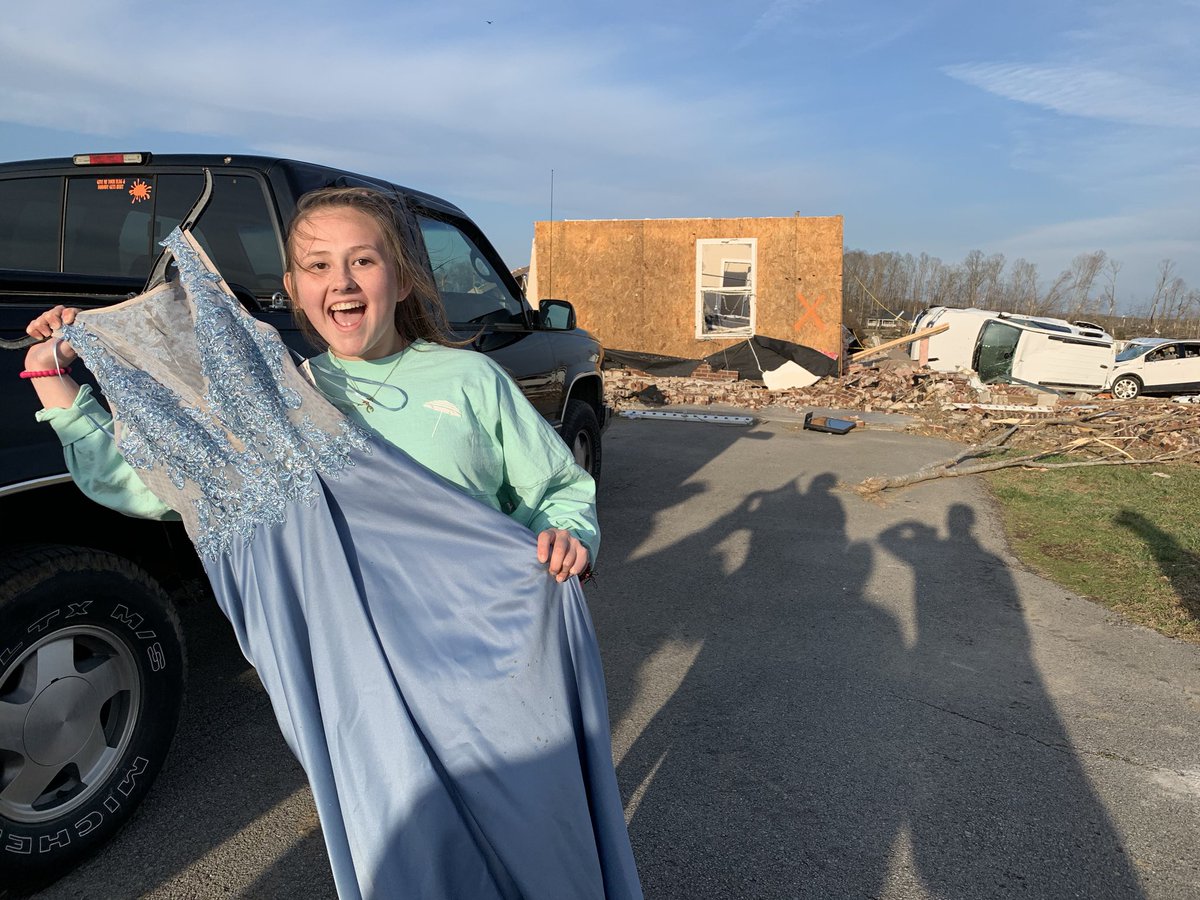 flakebarmer's tweet photo. I’ll make this the last of my tweets from Putnam County today. Aubrey Owen has her house collapse on top of her this morning. So she was pretty pumped when she found her prom dress wrapped around a fence post. And it’s not even that muddy! https://t.co/kah10sYFc6