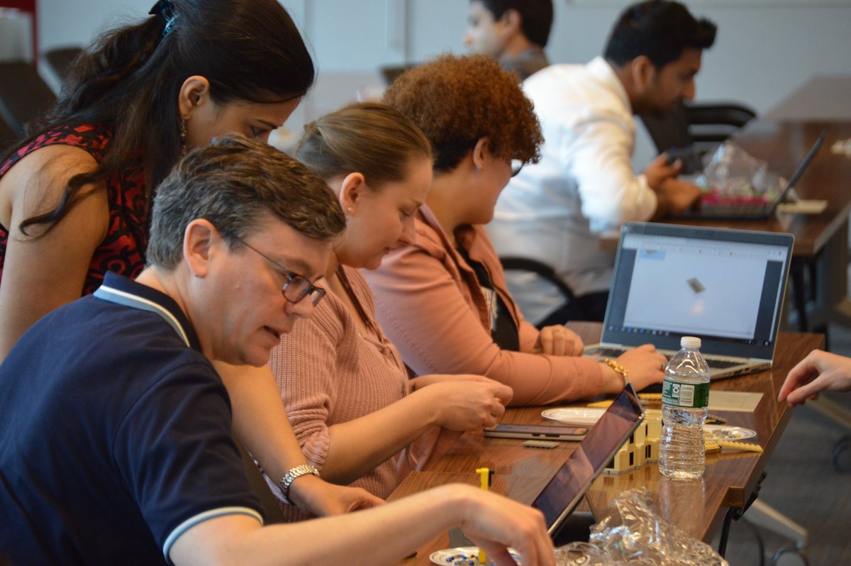 Infor's tweet photo. #TeamInfor and NYC FIRST hosted a LEGO kit-building session at Infor HQ, where employees assembled the different missions that FIRST LEGO League robots need to accomplish during tournaments. NYC FIRST engages 7,000 students annually with mentor-based #STEM &amp; robotics programs. https://t.co/mLsAzUDeOC