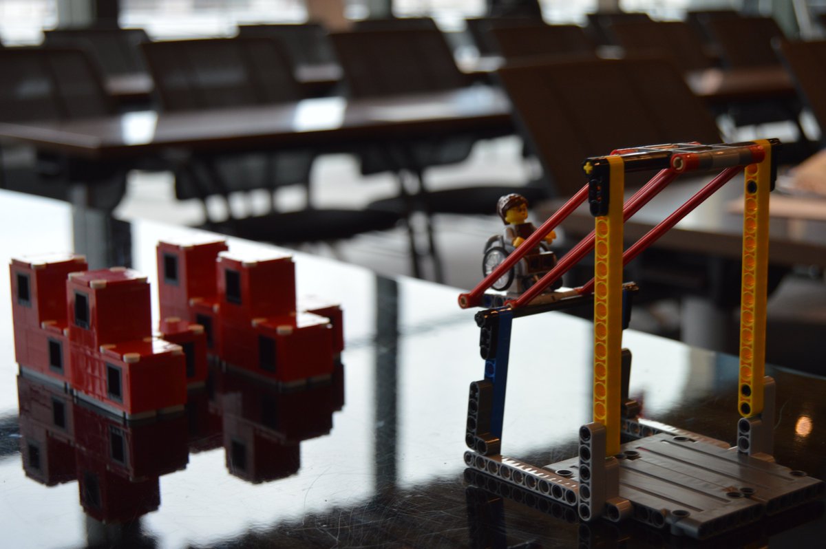 Infor's tweet photo. #TeamInfor and NYC FIRST hosted a LEGO kit-building session at Infor HQ, where employees assembled the different missions that FIRST LEGO League robots need to accomplish during tournaments. NYC FIRST engages 7,000 students annually with mentor-based #STEM &amp; robotics programs. https://t.co/mLsAzUDeOC