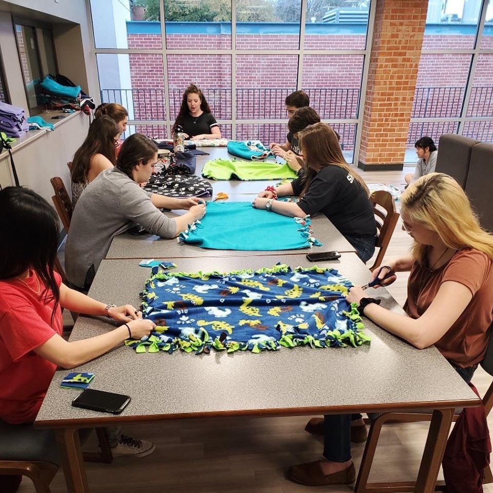 TUProLife's tweet photo. These are some of our members making baby blankets to donate to mother’s in need 😊
.
A big shoutout to the Catholic Student Group for partnering with us! Let’s do this again! https://t.co/49RFtXjJqN