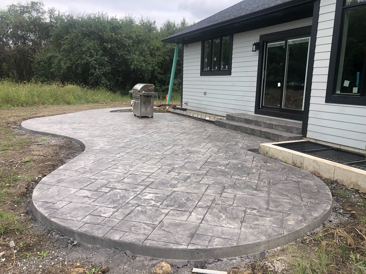 TotalPaving's tweet photo. Spring is just around the corner and NOW is the time to get estimates for your paving wish list! Check out this stamped concrete patio in Lincolnshire. Give us a call and we can set you up for an estimate today! #lincolnshire #totalpaving #totalpavingandbrick #stampedconcrete https://t.co/6jTvsWh1Ci