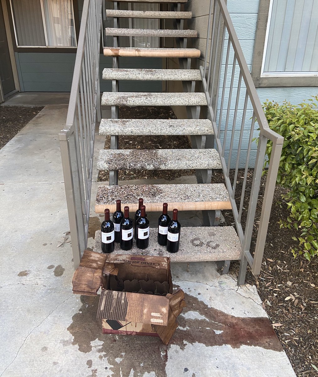 SoldBySyd's tweet photo. Shoutout to #2buckchuck @CharlesShawWine although the box broke halfway up the stairs, 🤦🏼‍♀️🤦🏼‍♀️ after rolling down each concrete stair we only managed to lose one bottle of wine. Stairs look like a crime-scene but we still have $21 worth of wine #winning https://t.co/q1ivO9S9fh