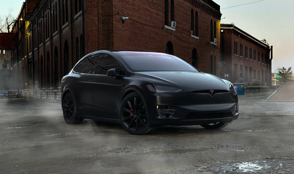 Darkside's tweet photo. With the historic Lemp Brewery as a backdrop the lines of this car really demand your focus. Nicely done @Tesla #modelXp100d wrapped by @stlautodetail1 🤘🔋 https://t.co/drUyilXquE