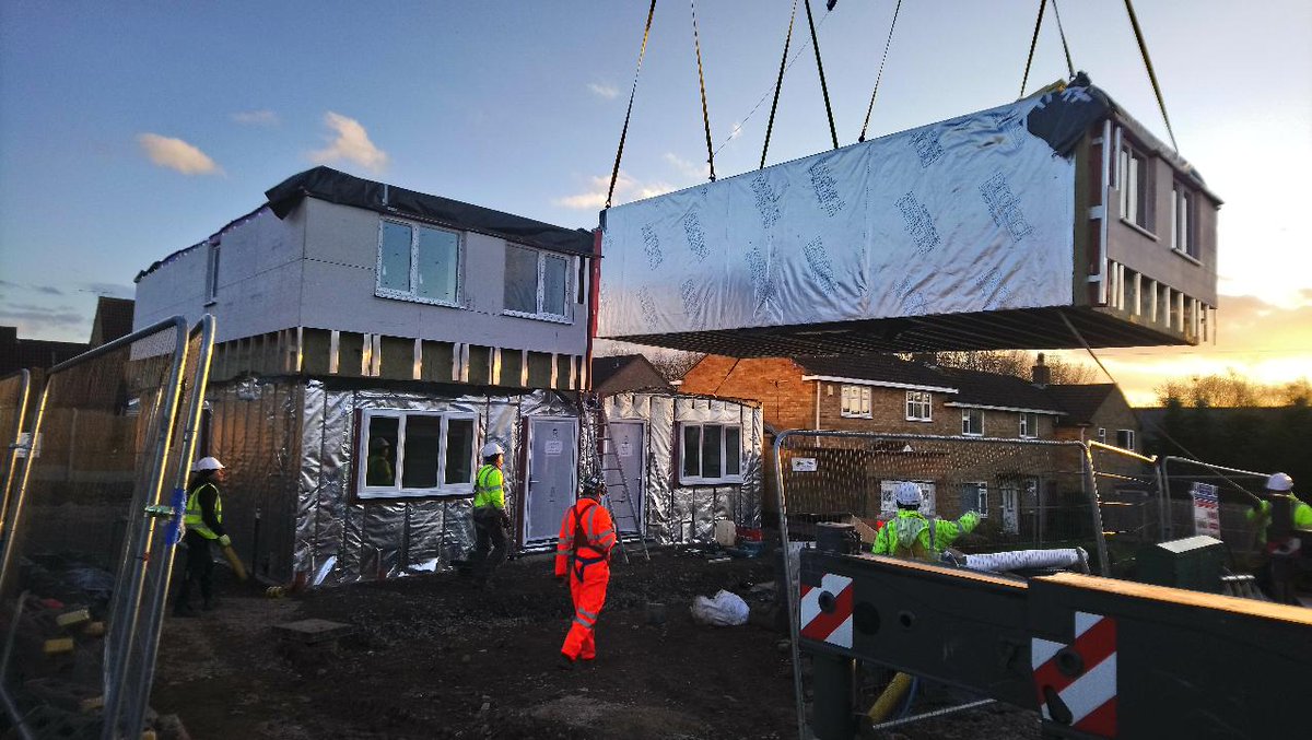 NBBCBuild's tweet photo. Councillor Watkins was on site yesterday to see the first of 28 modular affordable homes delivered at Abbotsford Road.  Developments at other sites in the Borough are well underway.  @NBBCouncil https://t.co/FbqVJ4wOBR