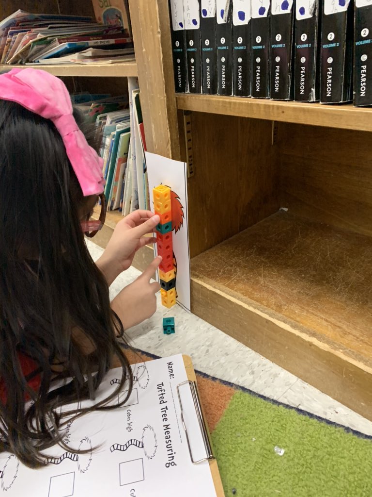 mary_wepner's tweet photo. Using non standard units of measurement to begin our unit this week by measuring truffula trees! Because measuring trees is a thing that everyone EVERYONE needs! @claremont_elem #ReadAcrossAmericaWeek https://t.co/gZcG4xRfVX