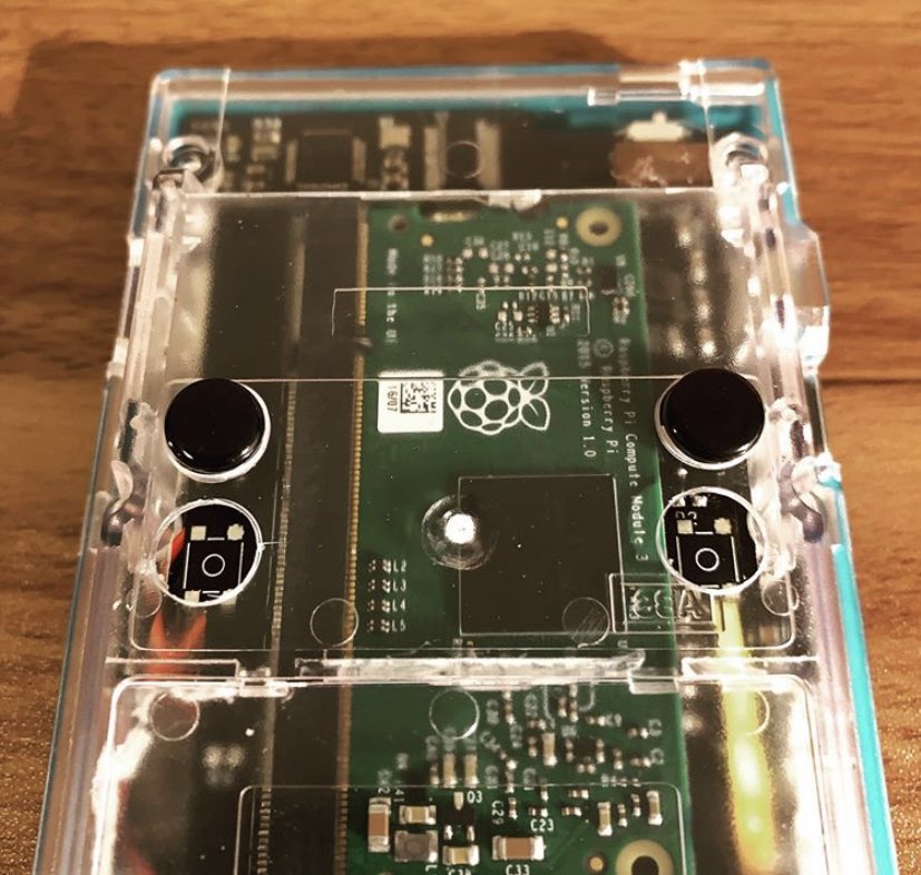 BluupLabs's tweet photo. Shoulder buttons cutting went well - they look like two little eyes 👀 Comfortable to use too! Not long until release now....maybe a little giveaway on our insta page too....#pocketpi #raspberrypi #RETROGAMING #gaming #gameboypocket https://t.co/0N7qdOKJsv