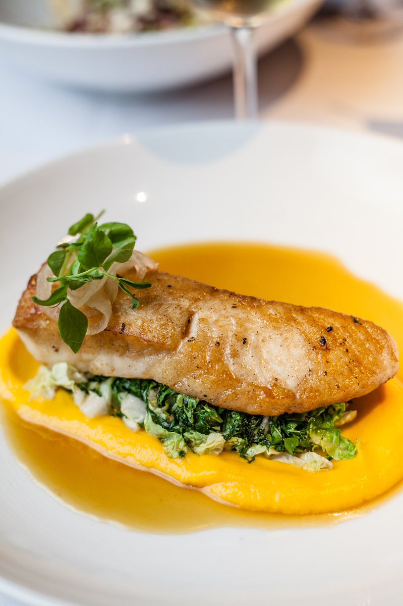 Wood oven roasted halibut with butternut squash, Napa cabbage, cippolinni dashi.