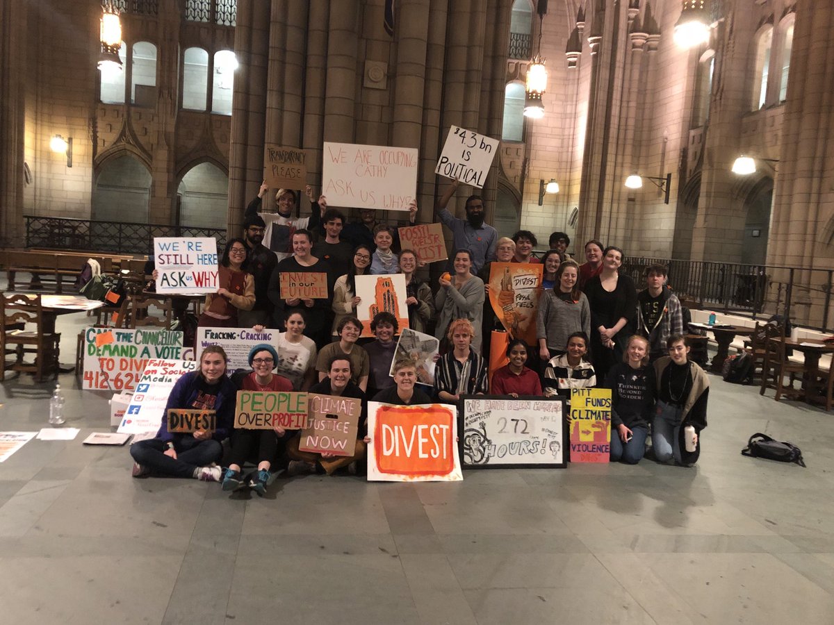 FossilFreePitt's tweet photo. Here’s us with the Clark University students. Thank you for your support — they are bringing us breakfast for DAY 13 😍🧡#occupycathy #divestpitt https://t.co/itAtUnwtbq