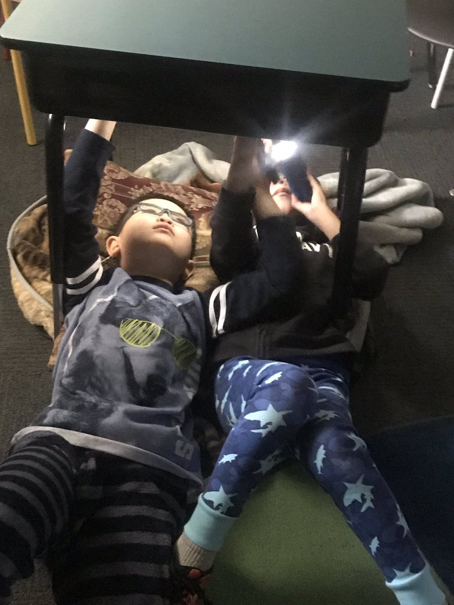 ColtsArroyo2's tweet photo. Celebrating Read Across America week! We’re nice and cozy in our pajamas and reading in the dark. @NISDFranklinES #KFEproud #2ndGrade https://t.co/MmlLqwZLYS