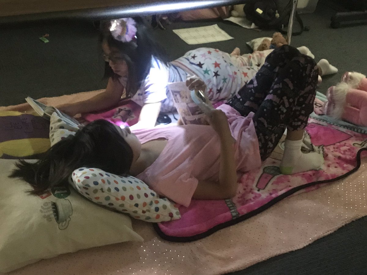 ColtsArroyo2's tweet photo. Celebrating Read Across America week! We’re nice and cozy in our pajamas and reading in the dark. @NISDFranklinES #KFEproud #2ndGrade https://t.co/MmlLqwZLYS