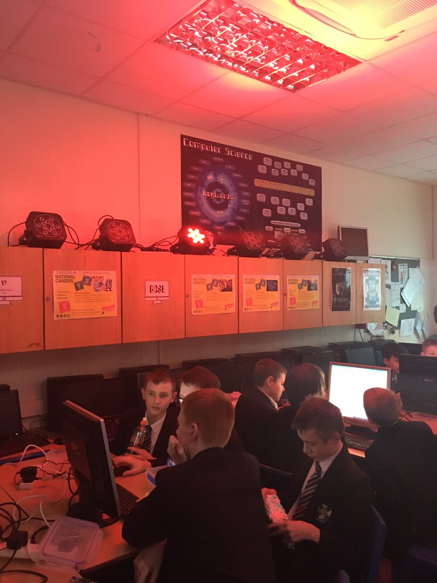 Pupils having fun programming in Python to control coloured lights in Raspberry Pi club. <a href="/WalesHigh/">Wales High School</a>
