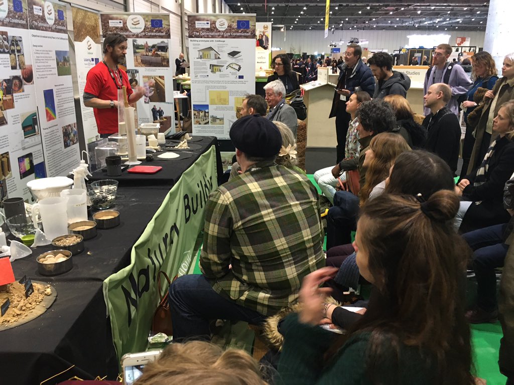 Rowland’s brilliant #earthbuilding demonstration captivating a large audience in the #NaturalBuilding area <a href="/FuturebuildNow/">Futurebuild</a> stand G70 <a href="/EarthBuildingUK/">EBUKI</a>
