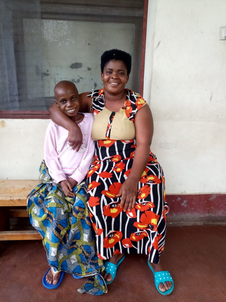 Nachamafrica's tweet photo. Madame Triphoni from Bubanza near her child suffering from a non curable chronic disease in Bdi causing repeated hospitalizations for th last 3 years,always smiling, persevering,she embodies hope.@ConilleGarry @MoravRaphael @SaveChildsHeart @KouassiNicole @tiemrich @OnufemmesBdi https://t.co/W3VAC79tFL