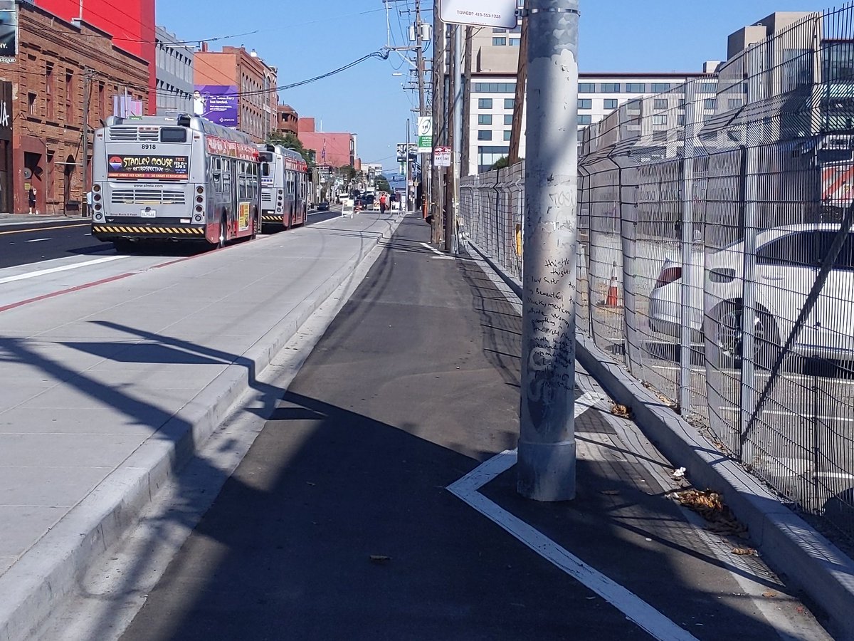 The brand new sidewalk-protected bike lane on Townsend is 9'10" wide, except at the utility pole choke points where it narrows to 6'2", 5'6", and a 5'1" / 4'1" split. Another cyclist tried to pass me right at the 5'6" narrows - don't fucking do that.