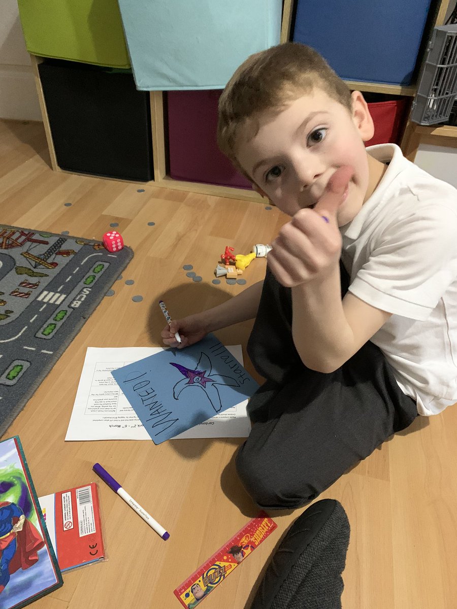 Logan completing his Wanted poster for Starro from the Justice League stories <a href="/CardonaldPri/">Cardonald Primary</a>