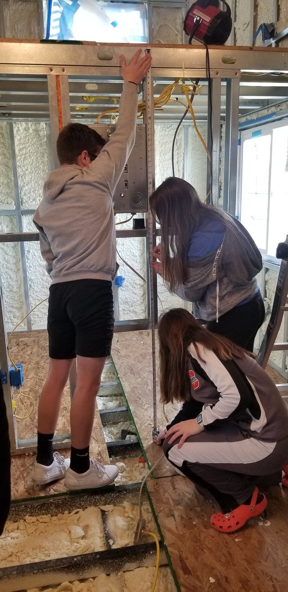 HCampbell204's tweet photo. Real Life Geometry happening today.  Students were given different sections of the BSHS Tiny House and must find the surface area and will report back to Mr.Mellick, the amount of ship lap that is needed for all the interior walls and ceiling.  @bshsprincipal https://t.co/Asr535tB0l