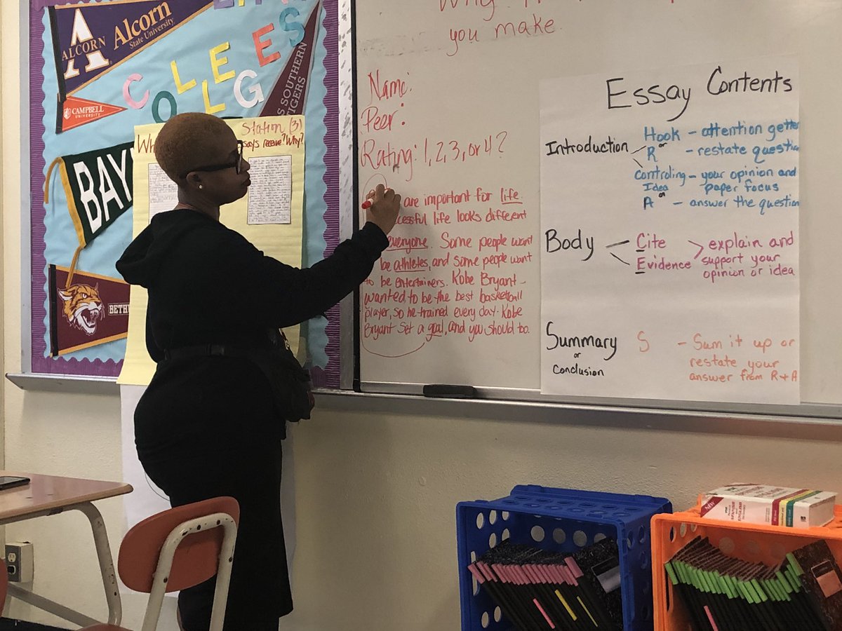 thepoetmendez's tweet photo. Deep in the work with @Melody_Gerard as she leads a mini-model of how to show elaboration in writing w/ the 7th grade ELA teachers at #ThomasMS https://t.co/v9JhNiMCRW