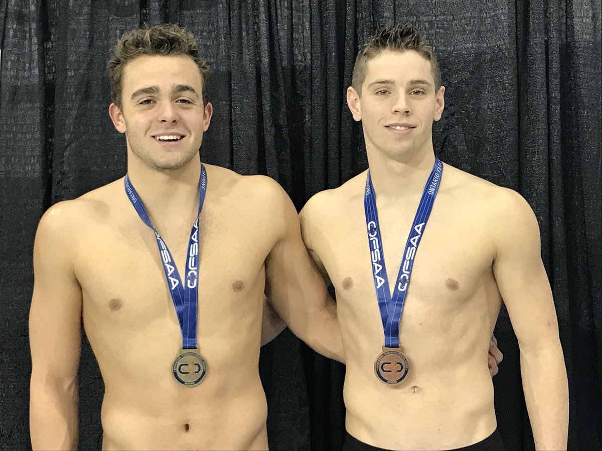 MelanieDenoon's tweet photo. Russell Burton sets another new OFSAA record in the 200m IM while teammate Marcus Beckstead Holman captures the bronze !! @ccviathletics https://t.co/GfmYMbsguB