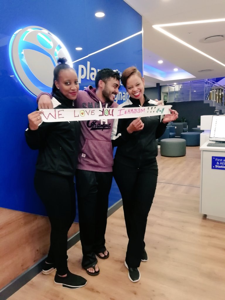 Iekraam_Adams's tweet photo. The best thing just happened to me right now. I'm exiting the gym and the receptionists pull this banner out and exclaim this message for the entire gym to hear! I'm feeling all kinds of wonderful emotions! #planetfitnesssignature #sandtongate #planetfitness #joburg #joy https://t.co/brvTM9PAkD
