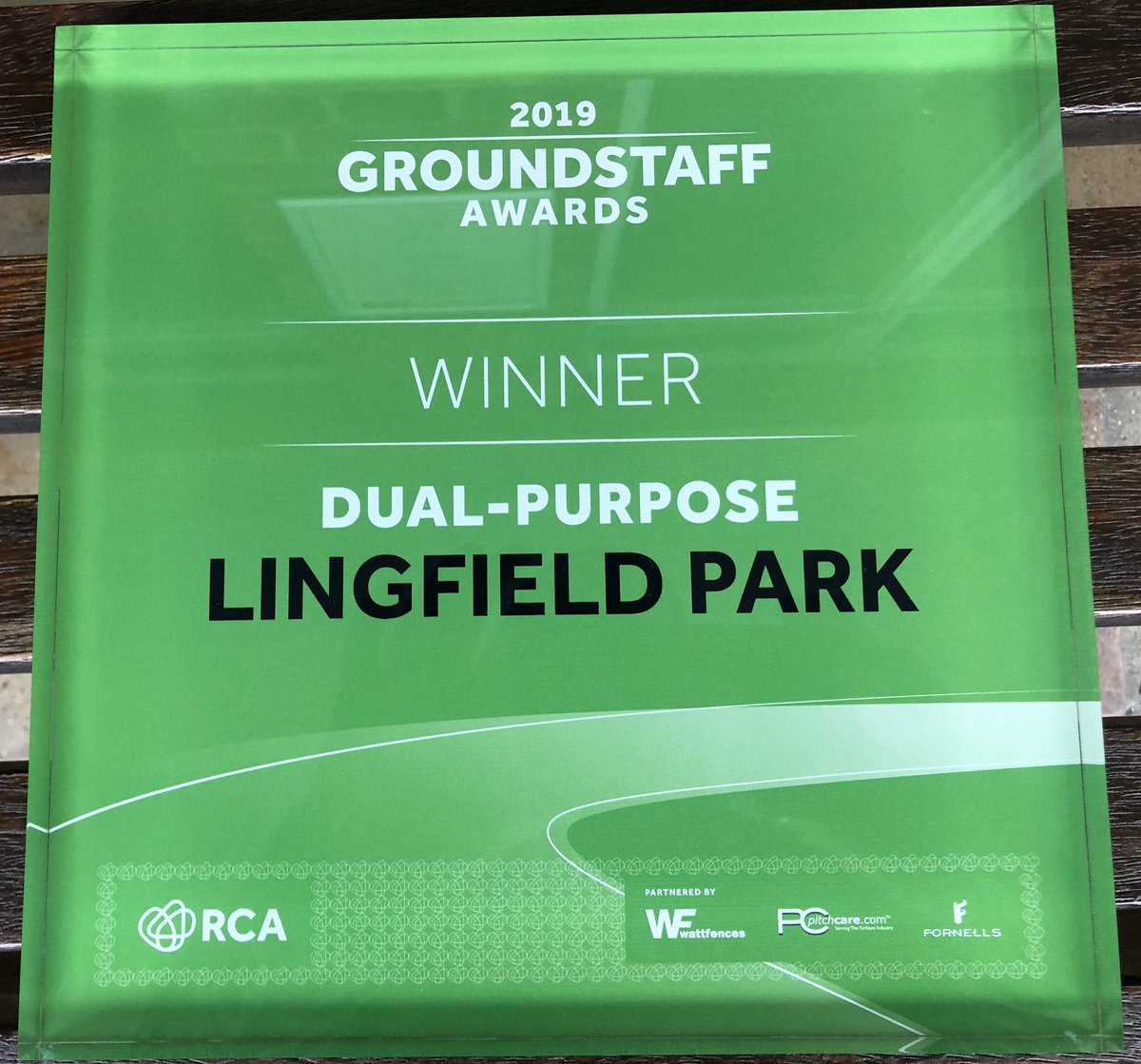 Pitchcare's tweet photo. Pitchcare were delighted to present the hard working Groundstaff team @LingfieldPark with the RCA Dual Purpose Award today for racecourse safety, presentation and configuration improvements made. Our pleasure meeting such a dedicated team, well done @WattFences @RCAShowcase https://t.co/07UbFfhI7O