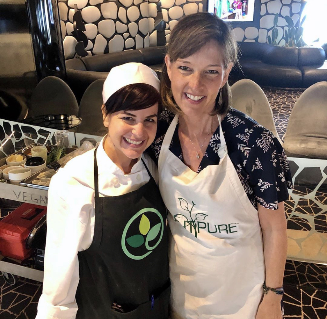 PlantPureNation's tweet photo. PlantPure Chef and Dr. Evelisse Capó teaching a cooking class at the Holistic Holiday at Sea! What are some plant-based recipes you would love to learn this spring? 🌱 #GoPlantPure https://t.co/Dw6bRRg3w1