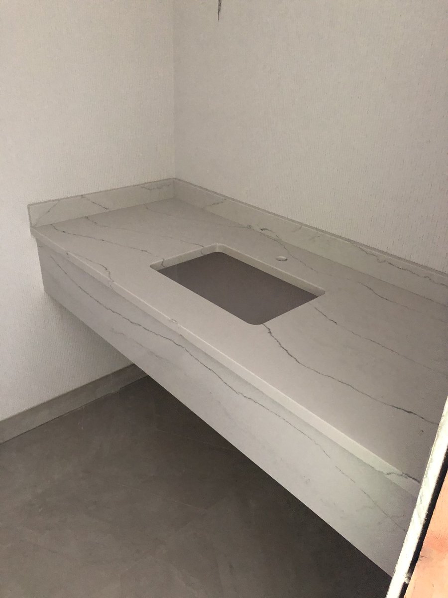 luxconst's tweet image. Things are moving along great installing the Cambria shower surrounds and counters at Viking Lakes Hotel👍