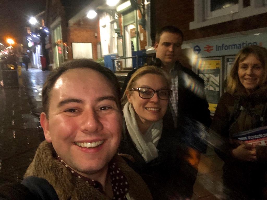 HGinnett's tweet photo. It’s raining but we’re still smiling as we speak to voters in #gipsyhill about @ShaunBaileyUK’s fantastic plans for #London. Together we will #MakeLondonSafe #backbailey2020 #ginn2win https://t.co/pNYkhp4SoR