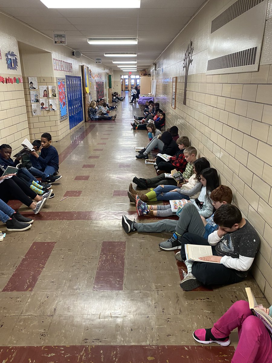 MPS_Buckley's tweet photo. It’s Read Across America week at Buckley. We had Sock, Drop and Read today in the hallway!  We read in the hallway with our crazy socks! https://t.co/lkhPoIh7mO