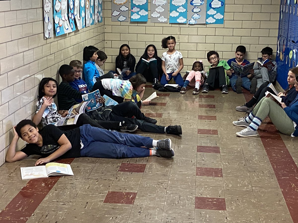 MPS_Buckley's tweet photo. It’s Read Across America week at Buckley. We had Sock, Drop and Read today in the hallway!  We read in the hallway with our crazy socks! https://t.co/lkhPoIh7mO