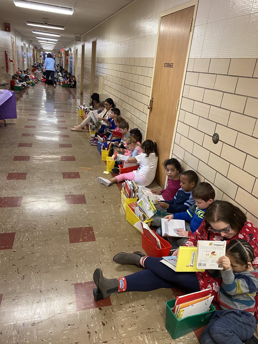 MPS_Buckley's tweet photo. It’s Read Across America week at Buckley. We had Sock, Drop and Read today in the hallway!  We read in the hallway with our crazy socks! https://t.co/lkhPoIh7mO